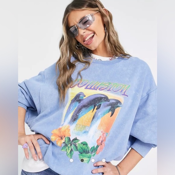 Collusion Unisex Sweatshirt in Dolphin Print in Blue Acid Wash - Picture 1 of 2